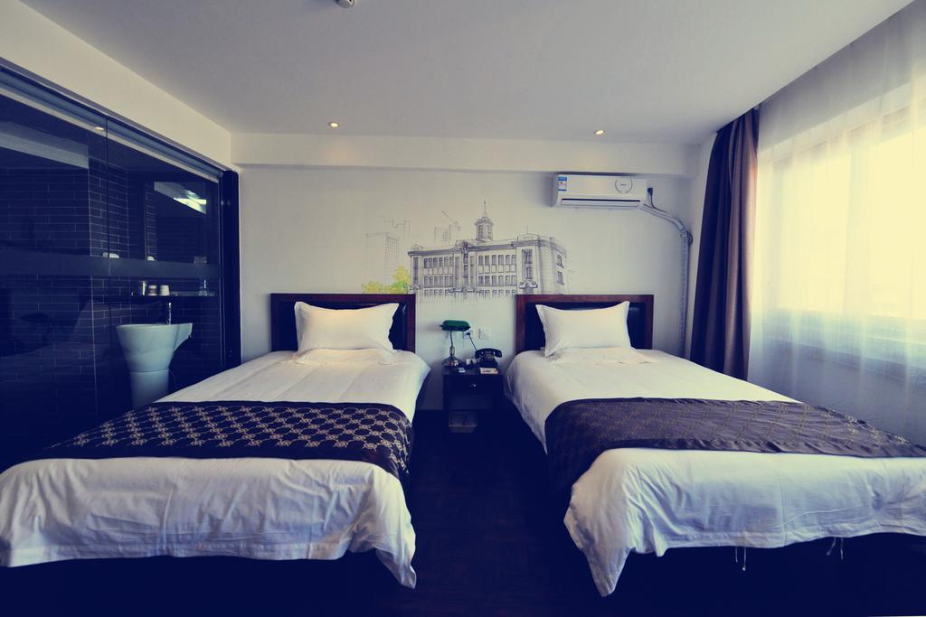 Nostalgiahotel-Tianjinguozhancenter Habitación foto
